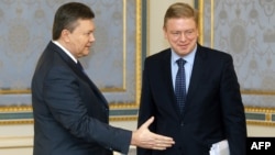 Ukrainian President Viktor Yanukovych (left) met with EU Enlargement Commissioner Stefan Fuele in Kyiv in early February.