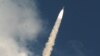 A launch vehicle, carrying the Mars orbiter probe as its payload, lifts off from the Satish Dhawan Space Center in Sriharikota, India on November 5.