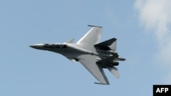 The incident involving a Sukhoi SU-30 fighter jet was "highly provocative," according to one U.S. official. (file photo)