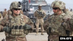 U.S. soldiers attend a training session for Afghan Army soldiers in Herat in February 2019.