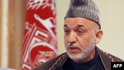 Afghan President Hamid Karzai announces his assets during a press conference in Kabul.