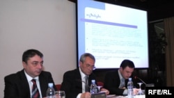 Tengiz Sharmanashvili (left) and Avtandil Demetrashvili (right) at the commission meeting in Tbilisi on May 11.