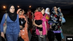 Pakistani students rescued from Osh arrive in Pakistan on June 15.