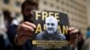 Demonstrators In Tbilisi Protest Azerbaijani Journalist's Alleged Abduction