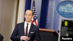 Senior White House adviser Stephen Miller waits to go on the air in the White House Briefing Room in Washington, D.C., on February 12.