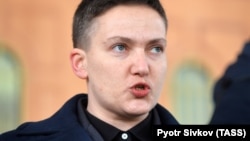 Lawmaker Nadia Savchenko talks to reporters outside the Ukrainian Security Service's headquarters on March 15. 