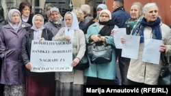 Members of a genocide victims and witnesses association protest in front of the Swedish Embassy in Sarajevo against the Nobel award to writer Peter Handke.