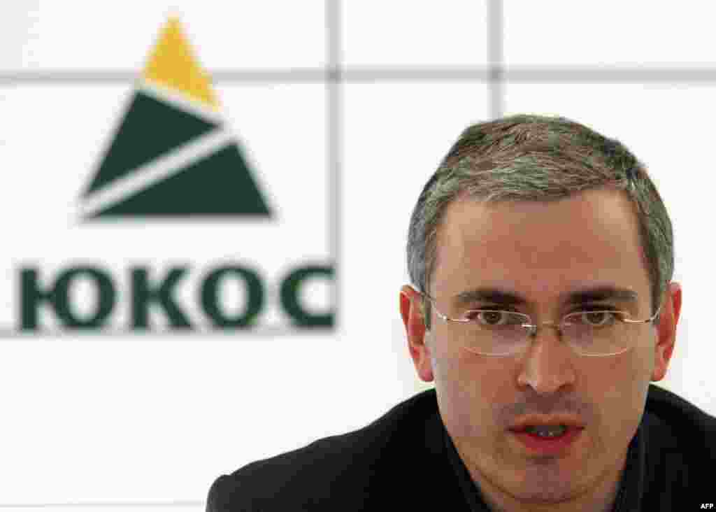 Khodorkovsky speaks at the Yukos headquarters in Moscow in June 2003, months before his arrest on fraud and tax evasion charges.