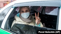 Lyubov Sobol is driven in a prison car to the headquarters of the Investigative Committee in Moscow on February 4.