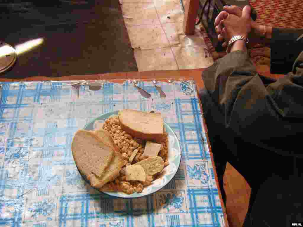 A bowl of bread and aruul, or dried cheese curds. - No Mongolian home is complete without a bowl of aruul on the table. The tough, sour blocks of curd -- made from cow, yak, or camel milk and slowly dried in the sun -- can be an acquired taste for outsiders. But they are vitamin-rich, long-lasting, and easy to carry -- an essential food for nomads who spend long days outside with no other source of nourishment. 