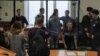 Members of an alleged terrorist group known as "Set" attend a court hearing in Penza on February 10. 