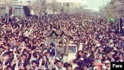 Supporters of the Islamic Revolution demonstrate in Tehran, 1979