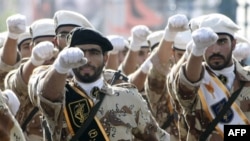 Members of Iran's elite Revolutionary Guards march in a military parade in 2008.