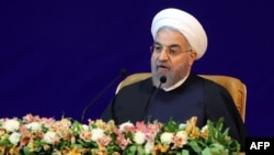 "Our economy will not prosper as long as it is monopolized [by the government]," said Iranian President Hassan Rohani. (file photo)