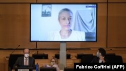 UN envoy Anais Marin is seen speaking via video link before a meeting of the United Nations Human Rights Council on allegations of torture and other serious violations in Belarus in September 2020.