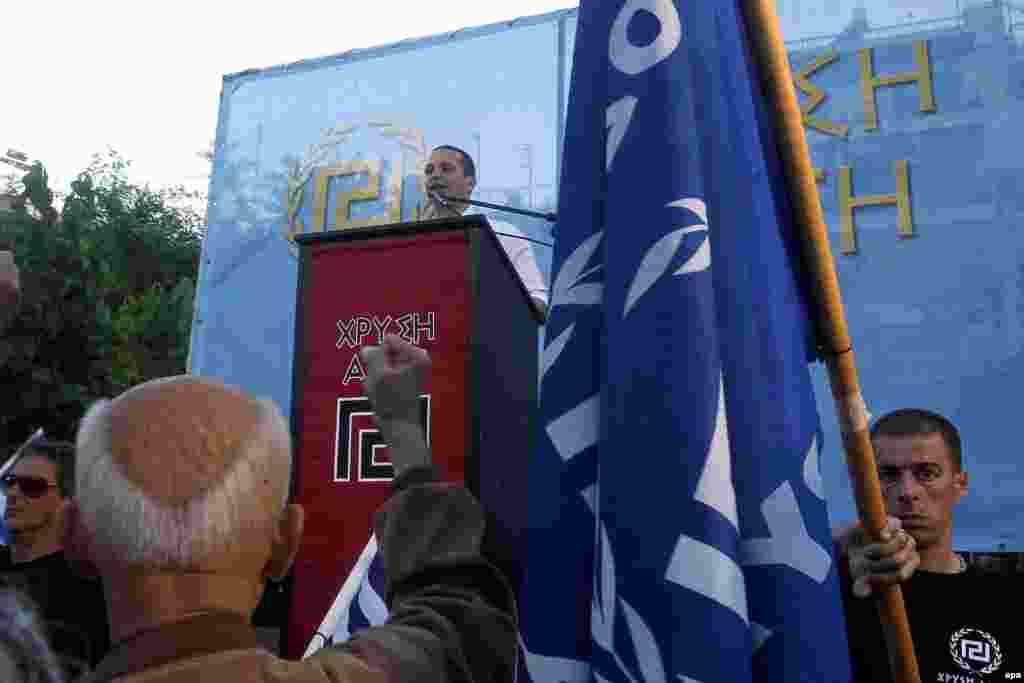 The far-right Golden Dawn party won around 10 percent of the vote in Greece, enabling it to enter the European Parliament for the first time. Here, Golden Dawn lawmaker Ilias Kasidiaris speaks at a pre-election rally. Six party leaders are currently in jail and other members are under investigation on charges of running a criminal organization.