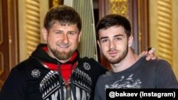 Chechen leader Ramzan Kadyrov (left) with singer Zelimkhan Bakayev (file photo)