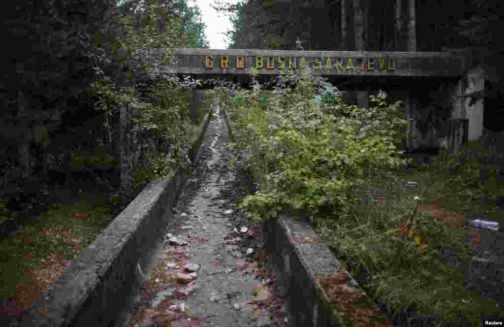 Bushes have grown over stretches of the bobsled track on Mount Trebevic, near Sarajevo.