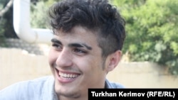 Azerbaijani photographer Mehman Huseynov after his release on June 13