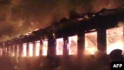 The burning retirement home in Podyelsk where 23 people died