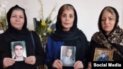 Nahid Shirpisheh (right) poses with other mothers who have lost sons to the state's repression of dissent.