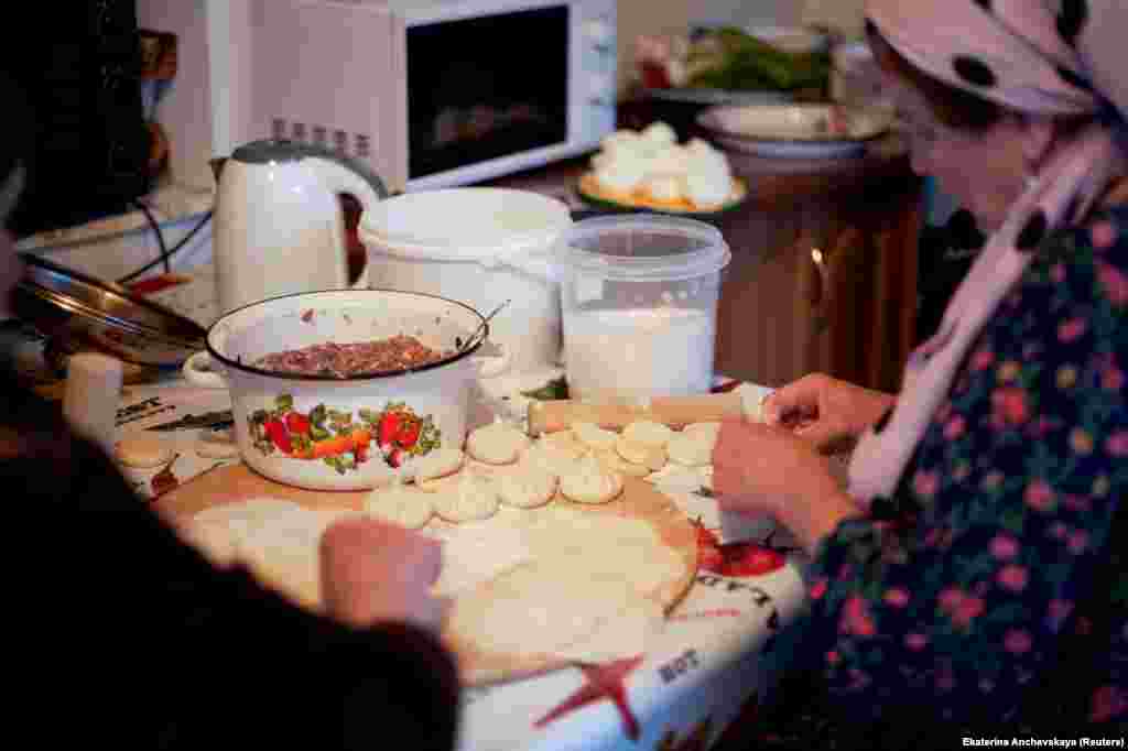 Pankisi women prepare kinkhali, a traditional Georgian dumpling dish. Photographer Anchevskaya told RFE/RL there are an increasing number of Saudi and other Arab tourists now staying in the gorge. &ldquo;They come because it&rsquo;s cheap, and also because of the Muslim culture -- they feel comfortable.&rdquo;