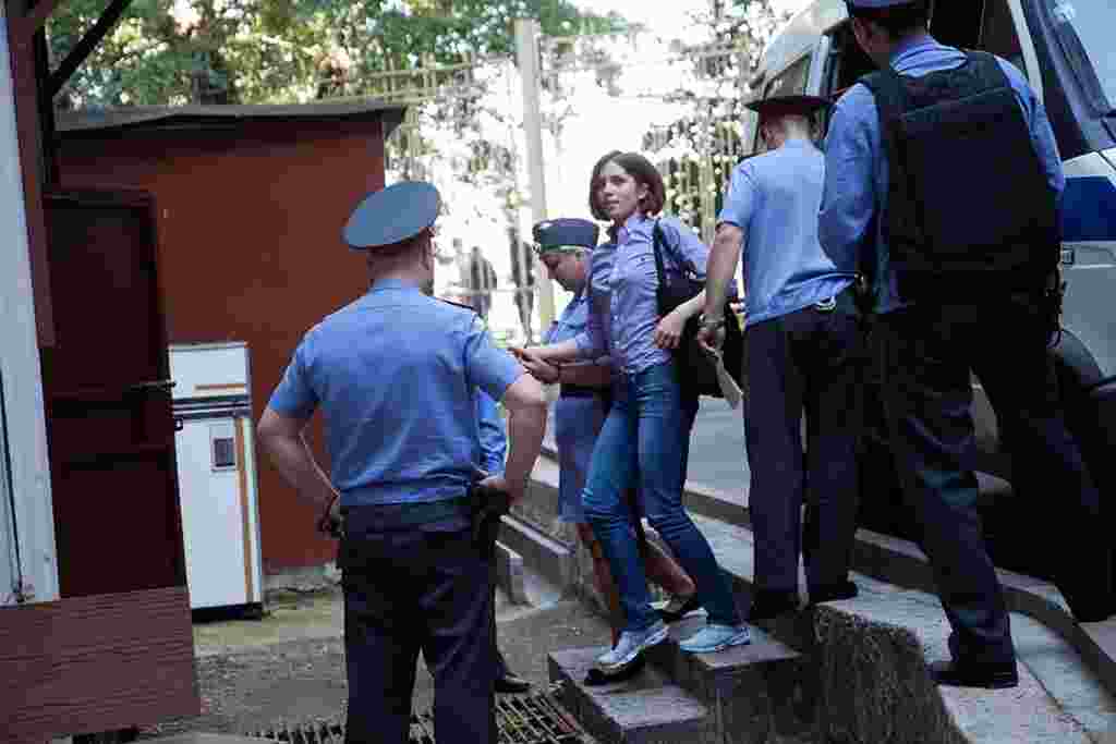 Pussy Riot member Nadezhda Tolokonnikova arrives at the court.