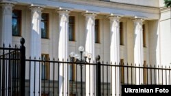 A new fence surrounds the parliament building in Kyiv.