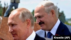 Belarusian President Alyaksandr Lukashenka (right) with Russian President Vladimir Putin (file photo)