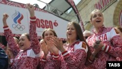 Russian competitors in synchronized swimming Anastasia Davydova, Natalia Ishchenko, Aleksandra Patskevich, and Daria Korobova (left to right) 