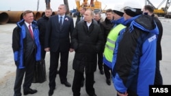 Russian President Vladimir Putin inspects the site of the under-construction bridge across the Kerch Strait to Crimea on March 18.