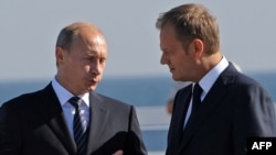 An end to calls for a boycott of Ukraine during Euro 2012 is one thing Polish Prime Minister Donald Tusk (right) and Russian President-elect Vladimir Purin can see eye to eye on.