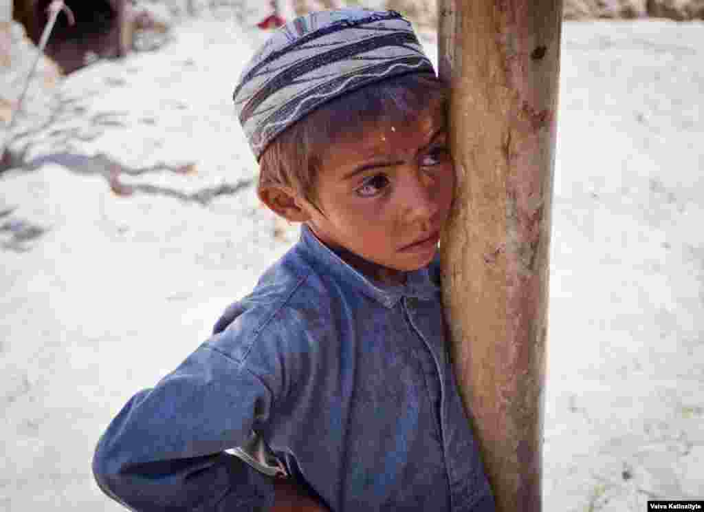 Khalid, 8, fled with his family from their home in Samangan Province. 