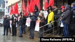 Moldovan Socialists protest the devaluation of the currency, the lei, in front of the National Bank in Chisinau recently.