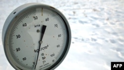 A valve and pressure gauge at a compressor station in the Ukrainian village of Boyarka.