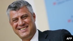 Kosovo Prime Minister Hashim Thaci smiles during a press conference by the International Steering Group for Kosovo in Vienna on July 2.