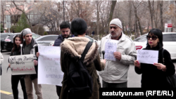 Armenian supporters of jailed Iranian rights lawyer Nasrin Sotoudeh gather outside Iran’s Embassy in Yerevan on March 19 to call for her release.