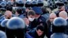 Riot police confront participants in the April 2020 rally protesting coronavirus measures in Vladikavkaz.