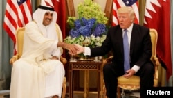 Qatari Emir Sheikh Tamim Bin Hamad al-Thani meets with U.S. President Donald Trump in Riyadh on May 21.