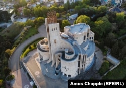 Tbilisi’s Palace of Rituals, a swirling stone structure completed in the 1980s and now owned by a Georgian oligarch