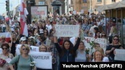 Belarusian teachers attend a rally in support of the opposition, against police brutality and the results of the presidential election in Minsk on August 14.