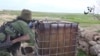 Russian-Speaking Militants Appear In New Video Of Fighting Near Kobani