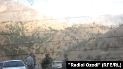 Security and local officials confer in Rasht Valley after armed clashes in late September.