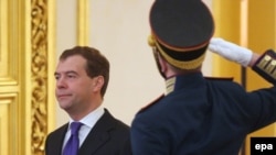 President Dmitry Medvedev enters meeting of State Council session on political reform on January 22.