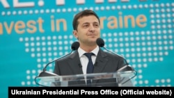 Ukrainian President Volodymyr Zelenskiy delivers the opening speech at the investment forum in Mariupol.