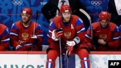 Aleksandr Ovechkin looks on from the bench during the Russian ice hockey team's quarterfinal loss to Canada.