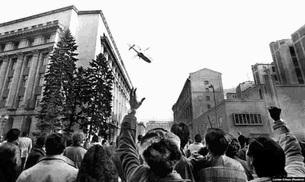 December 1989: Revolution in Romania. After scores of civilians are killed in a crackdown on antigovernment demonstrators, communist leader Nicolae Ceausescu makes a speech aimed at demonstrating the people&rsquo;s &quot;devotion&quot; to him and his equally hated wife. Remarkable live footage of the address broadcasts the moment crowds begin jeering and the omnipotent tyrant shrinks into a confused old man. As people flood the streets the Ceausescus flee in a helicopter. They are soon caught and executed by firing squad.&nbsp; &nbsp;