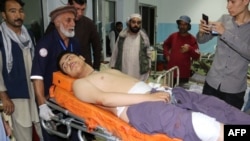 An injured man is treated at a hospital following a deadly attack in Kabul on September 5.