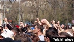 People gather in the center of Chisinau on April 8 to protest the election results.