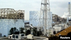 A March 15 photograph of Reactors No. 1, 2, 3 and 4 at the Fukushima Daiichi Nuclear Power Plant (handout)